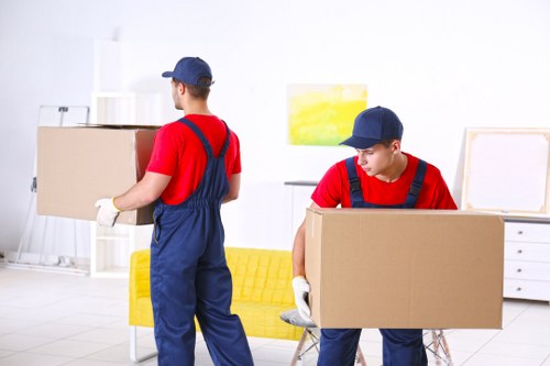 Removal team planning a home move on a Fulham residential street