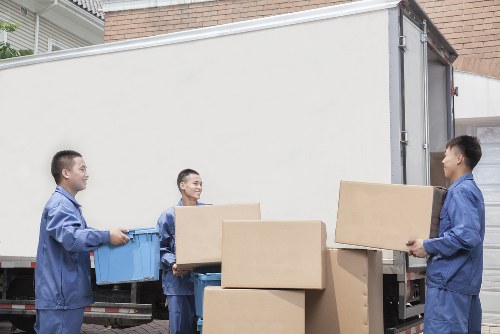 Local movers preparing furniture for collection from a Fulham flat