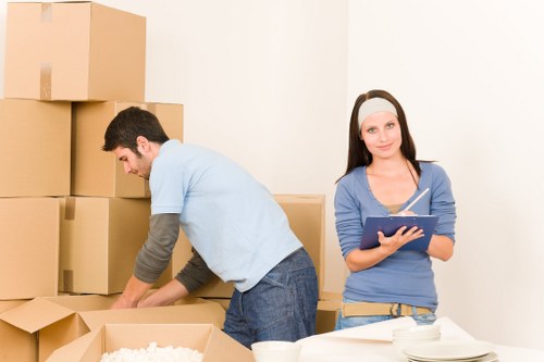 Careful loading of student furniture and packed boxes for a local move