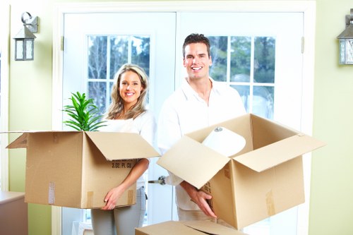 Packing boxes and household items prepared for a move in Fulham