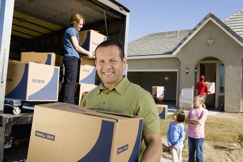 Team communicating during a property move to prevent hazards